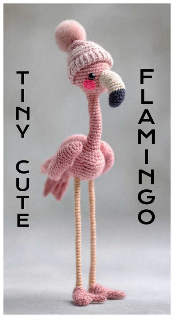 tall pink flamingo amigurumi wearing a tiny hat long leg crochet flamingo plush idea