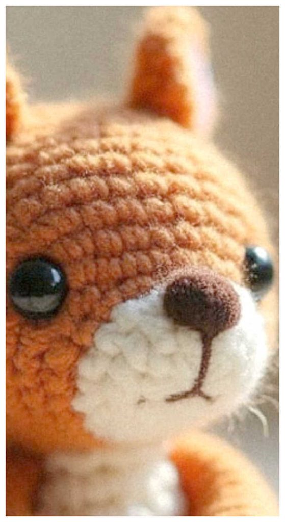 close up squirrel amigurumi crochet doll detail charming handmade woodland animal toy