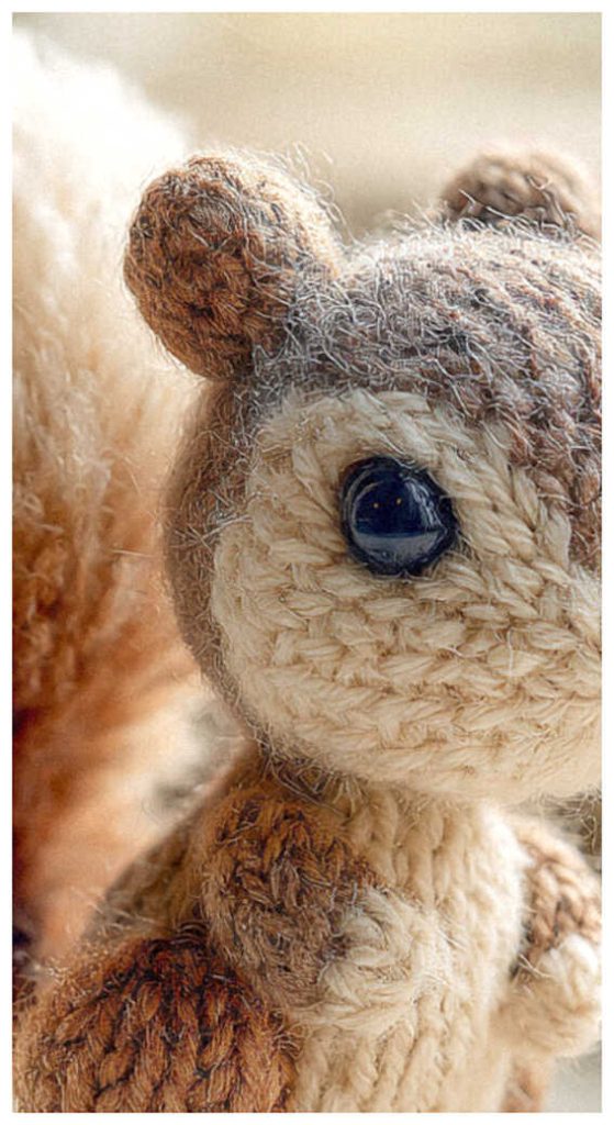 close up squirrel amigurumi crochet doll soft texture handmade woodland animal toy