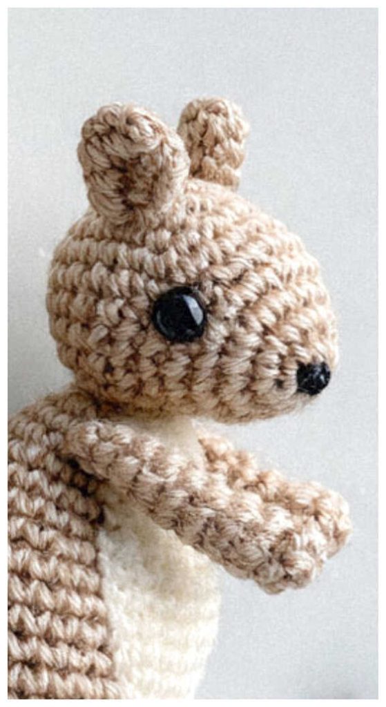 cute squirrel amigurumi crochet doll side view charming handmade woodland toy