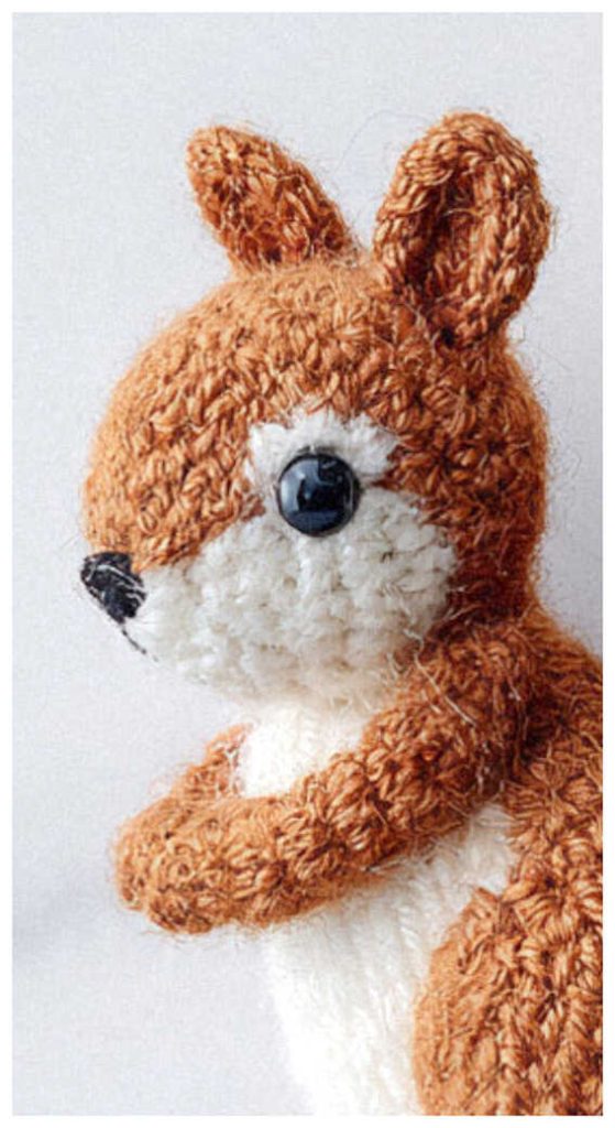 adorable squirrel amigurumi crochet doll side view soft handmade woodland animal design